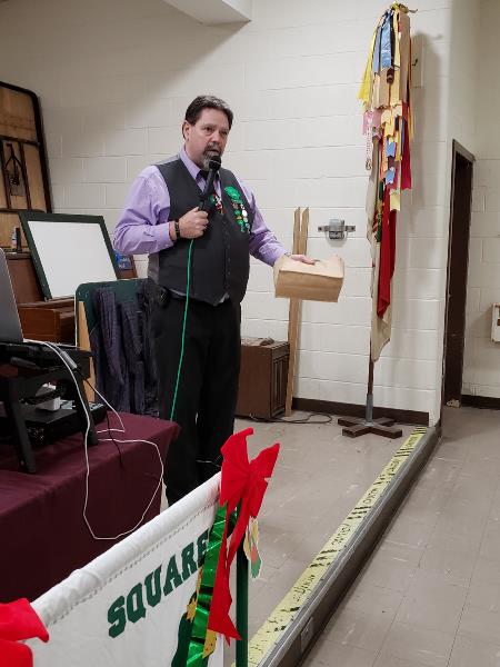 Henry, our President with a gift for Mike