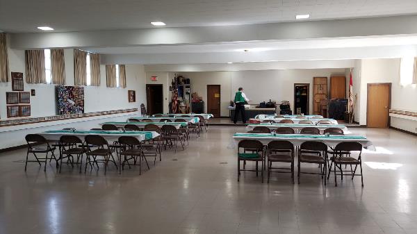 Early room setup (Jim Gotta in the background)